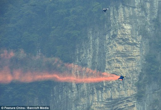 Wingman Jeb Corliss 'Flies' Through China's Tianmen Cave